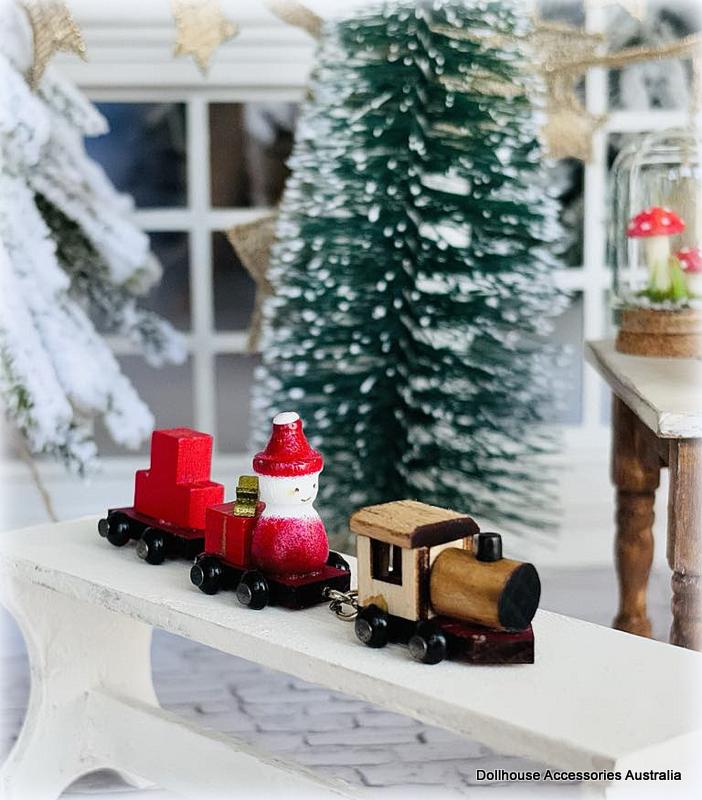 Dollhouse Christmas toy train snowman