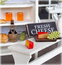 Dollhouse cheese with red rind edam dutch wax