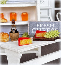 Dollhouse cheese with red rind edam dutch wax