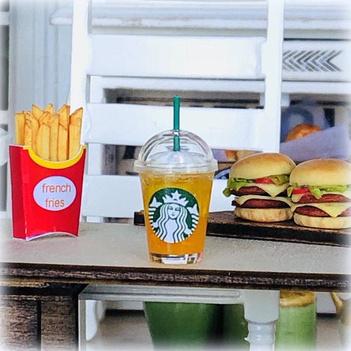 Dollhouse Iced Orange Juice in Takeaway Cup