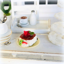 Dollhouse dessert panna cotta with raspberry coulis