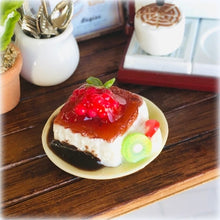 Dollhouse dessert panna cotta with raspberry coulis