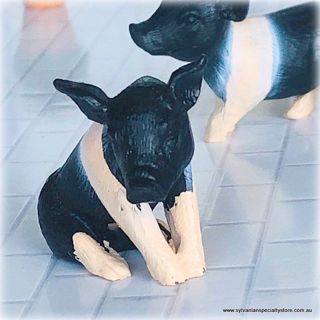 Dollhouse miniature piglets