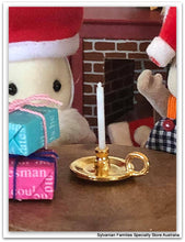 Sylvanian Families with Christmas candlestick and golden holder