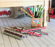 Box of Christmas wrapping paper - These Do not Unroll -  Miniature