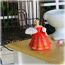 Dollhouse ornament figurine lady in orange