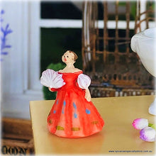Dollhouse ornament figurine lady in orange