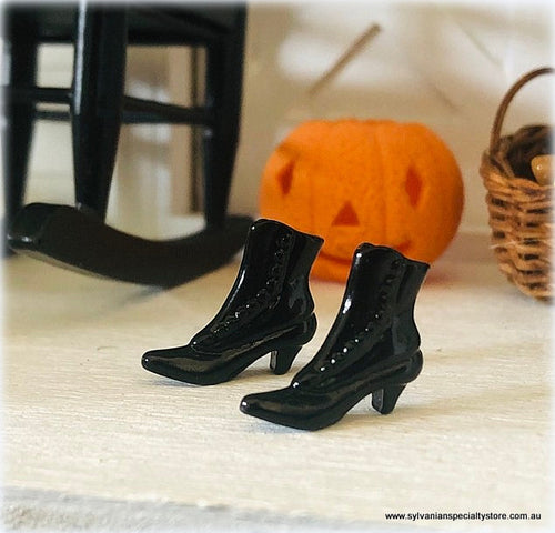 Dollhouse black pair of boots