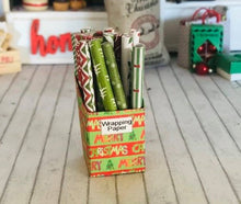 Box of Christmas wrapping paper - These Do not Unroll -  Miniature