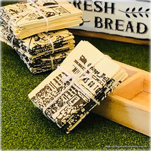 Newspapers Tied with String - Miniature