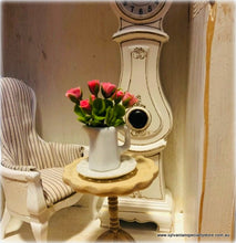 Dollhouse miniature pink roses in ceramic vase jug
