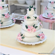 Dollhouse miniature pink tiered pink roses wedding cake