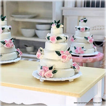 Dollhouse miniature pink tiered pink roses wedding cake
