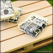 Newspapers Tied with String - Miniature