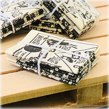Newspapers Tied with String - Miniature