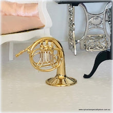 Dollhouse miniature french horn musical instrument