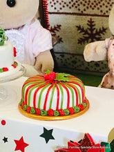 Sylvanian Families enjoying christmas cake