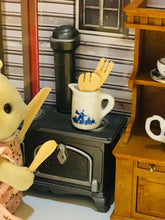 Blue jug with wooden utensils