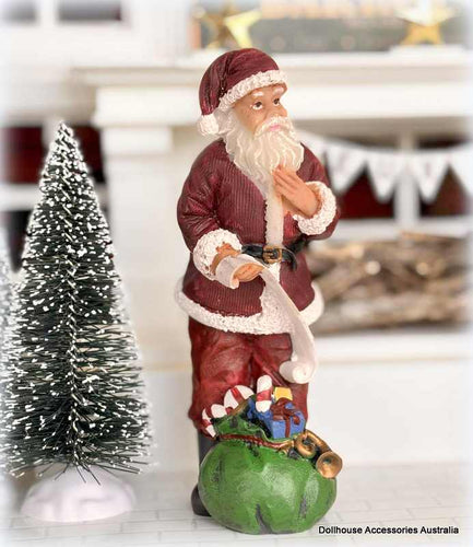Thoughtful Santa Claus Figure - 12 cm high - Miniature
