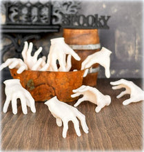 dollhouse halloween creepy hand Addams Family spooky