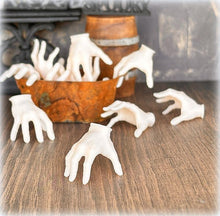dollhouse halloween creepy hand Addams Family spooky