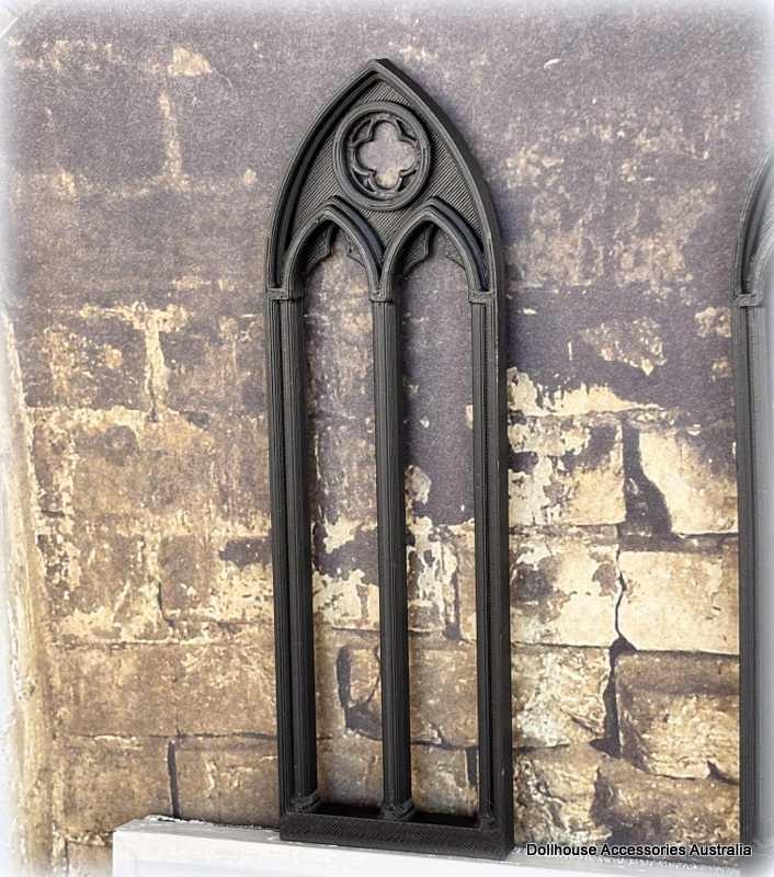 Dollhouse Gothic-style window frame against a textured stone wall