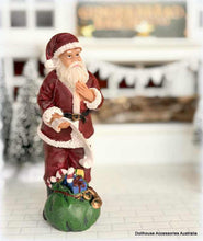 Thoughtful Santa Claus Figure - 12 cm high - Miniature