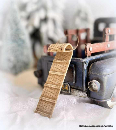 Dollhouse miniature toboggan sled winter diorama scene
