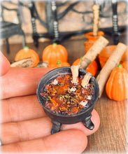 Dollhouse witch cottage cauldron stew with bones and eyeballs