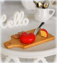 Dollhouse gouda red cheese on board 