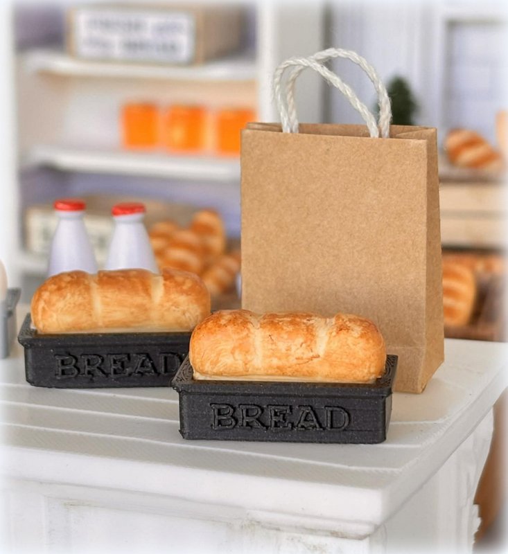 Dollhouse fresh loaf bread out of oven in baking pan