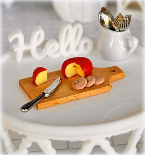 Dollhouse gouda red cheese on board 