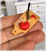 Dollhouse gouda red cheese on board 
