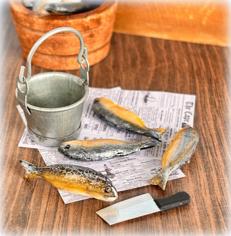 Dollhouse miniature metal bucket with fish and knife fisherman