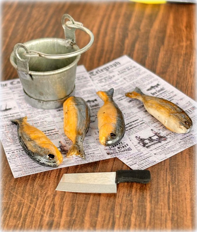 Dollhouse miniature metal bucket with fish and knife fisherman
