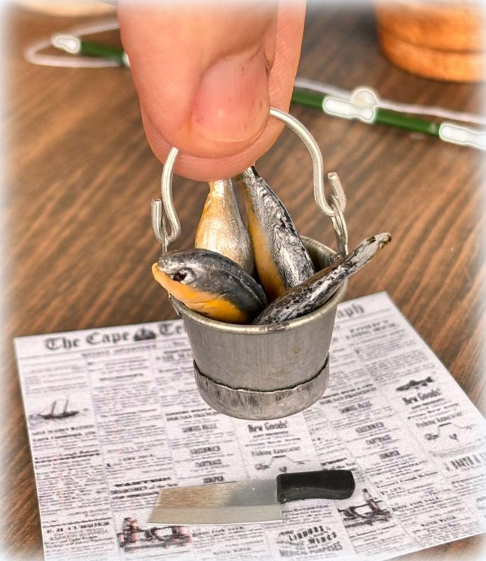 Dollhouse miniature metal bucket with fish and knife fisherman