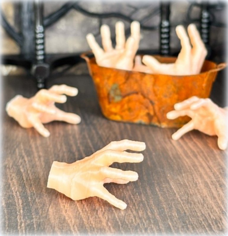 Dollhouse halloween Addams family hand