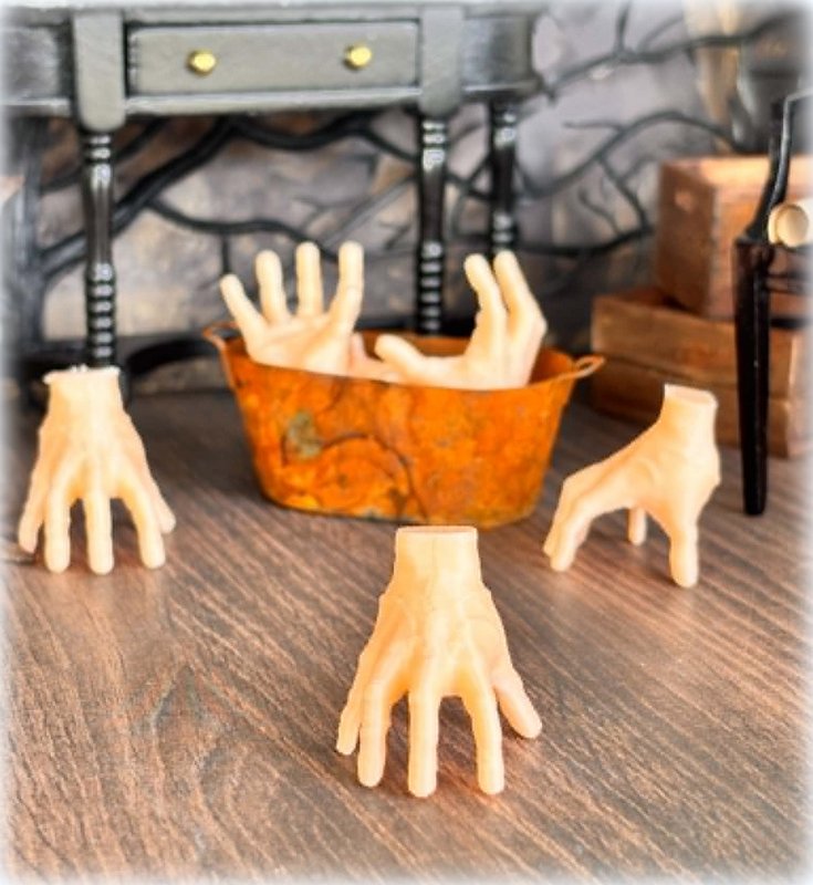 Dollhouse halloween Addams family hand