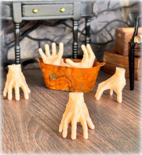 Dollhouse halloween Addams family hand