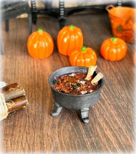 Dollhouse witch cottage cauldron stew with bones and eyeballs