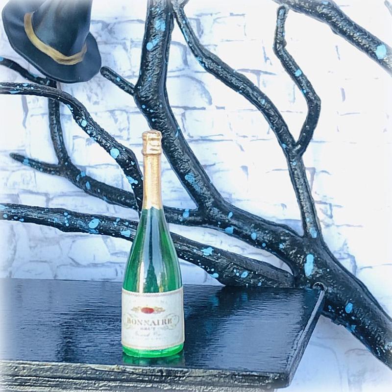 Dollhouse champagne bottle drink