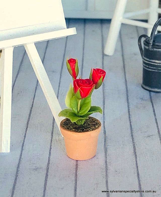 Dollhouse miniature red roses in pot clay flowers