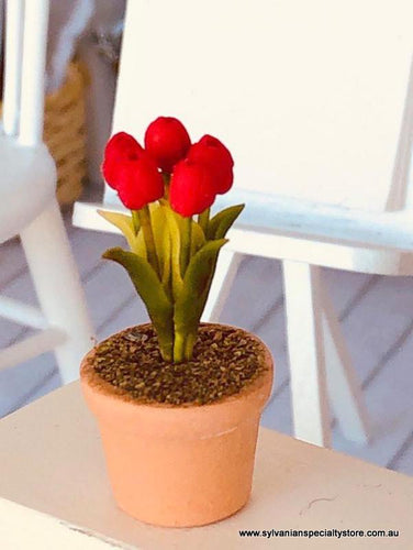 Dollhouse miniature red tulip flower in pot