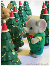 Sylvanian Families elephant enjoying decorated miniature christmas tree