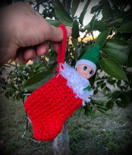 Elf baby in Christmas stocking