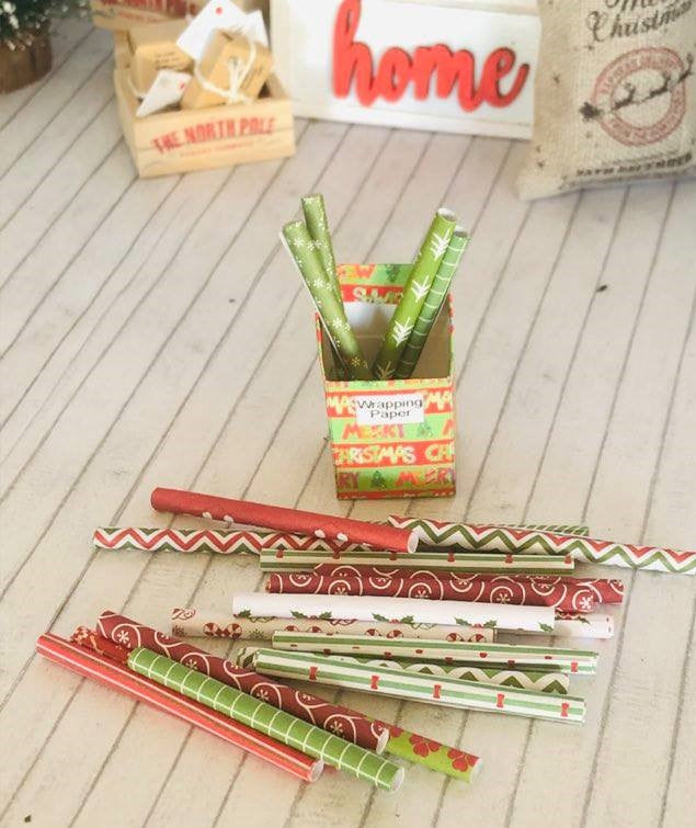 Box of Christmas wrapping paper - These Do not Unroll -  Miniature