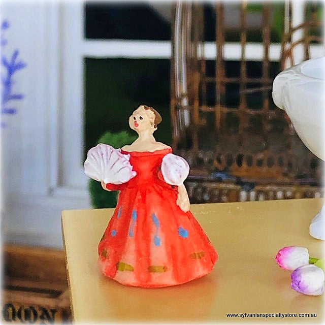 Dollhouse ornament figurine lady in orange