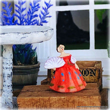 Dollhouse ornament figurine lady in orange