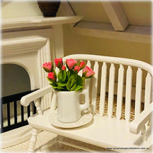 Dollhouse miniature pink roses in ceramic vase jug