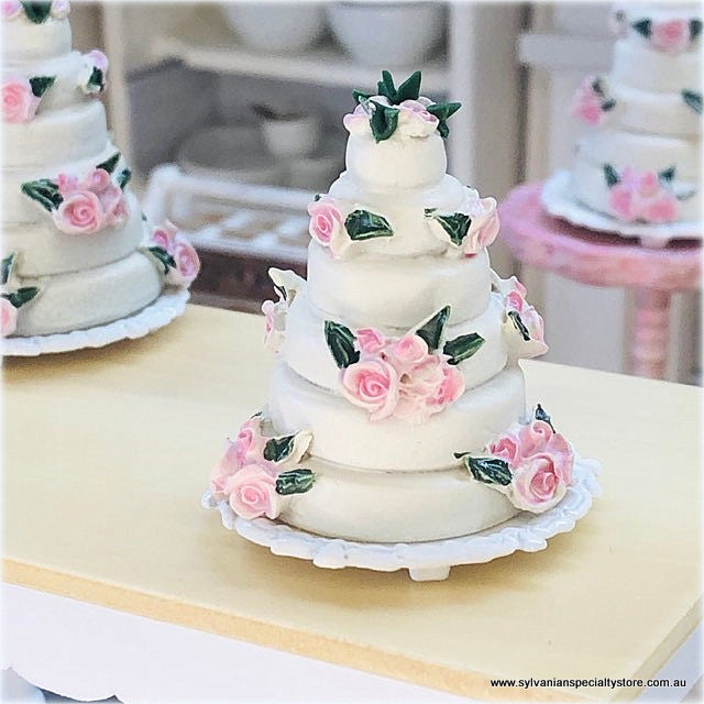 Dollhouse miniature pink tiered pink roses wedding cake